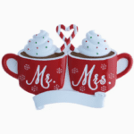 Warm up your holiday season with our Mr. & Mrs. Hot Cocoa Mugs Personalized Ornament. Featuring two festive mugs of hot cocoa topped with whipped cream and candy canes, this adorable ornament is the perfect way to celebrate newlyweds, engaged couples, or long-time spouses. Personalize it with names and the year to create a sweet keepsake that captures the love and warmth of the season. Crafted with cheerful holiday details and vibrant colors, this ornament symbolizes togetherness and cozy winter nights. Its lightweight yet durable design ensures it hangs beautifully on your Christmas tree and will be treasured year after year.
